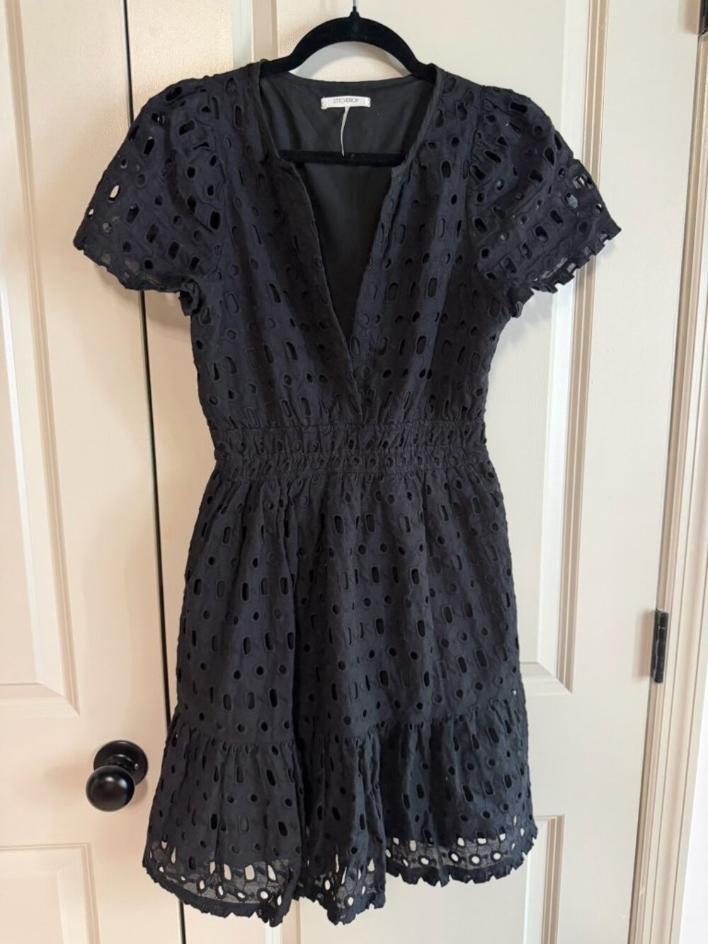 StitchDrop Black Eyelet Mini Dress | XS | Smocked Waist | Flutter Sleeve